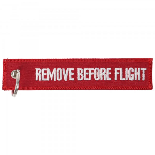 Anhänger mit Schriftzug Remove before flight ca. 13 x 2,8 cm